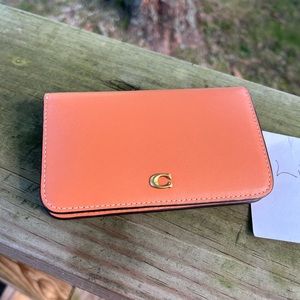 Coach foldover card case